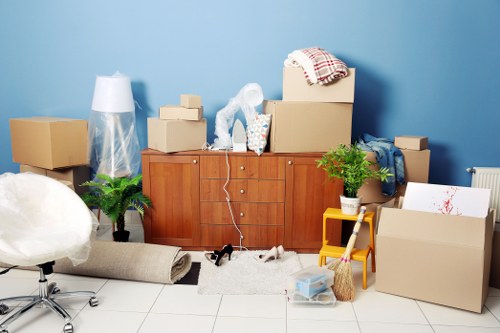 Office removals team preparing equipment for a move in Earls Court