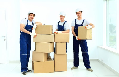 Removal team planning a move in Earls Court with boxes and furniture