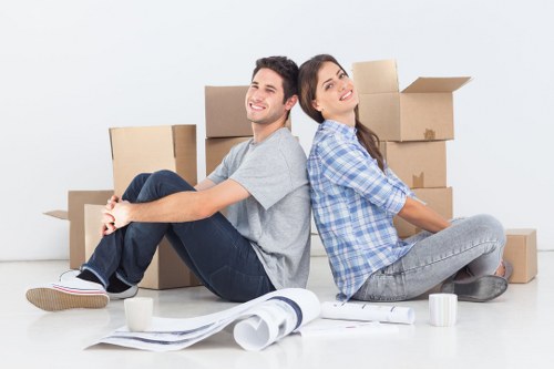 Business relocation setup with labeled boxes and office equipment