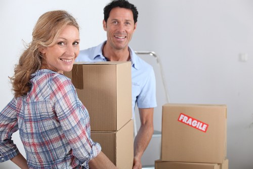 Professional movers handling access challenges in an Earls Court flat